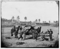 Zouave ambulance crew demonstrating removal of wounded soldiers from the field