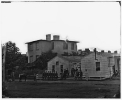 Washington, District of Columbia. Eight soldiers in formation in front of temporary buildings