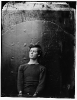 Washington Navy Yard, District of Columbia. Lewis Payne in sweater, seated and manacled