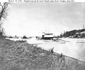 Federal ironclads in Trent's Reach, James River, Virginia 
 
    Photographed circa early 1865. 
    Nearest ship is USS Saugus, with a mine sweeping 