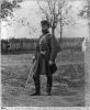 7th N.Y. State Militia officer posed in full uniform holding drawn sword. Camp Cameron, D.C. 1861
