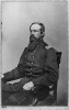 Edward E. Cross, three-quarters length portrait, seated in chair, facing left, in uniform. Col., 5th N.H. Infantry