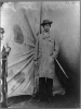 Lewis Payne, Lincoln conspirator, full-length portrait, standing in front of tent, facing right