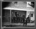 Gen. Alexander McCook and staff posed on porch near Washington, D.C.