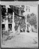 Headquarters of Gen. Thomas West Sherman, Beaufort, S.C., and soldiers with musical instruments standing on and in front of porch