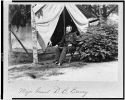 Major General D.B. Birney, full-length portrait, seated in front of tent, facing left