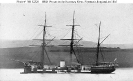 HMS Wivern (British Turret Ironclad, 1865-1922) 
 
    At anchor in the Hamoaze River, off Plymouth, England, in 1865. 
    The original print is mounted on a carte de visite. 
    Note the lowered bulwarks abreast her two turrets, h