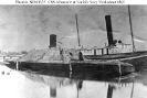 CSS Albemarle (1864-1864) 
 
    At the Norfolk Navy Yard, Virginia, after salvage, circa 1865. 
    Two ladies are standing on her deck, near a section of displaced
    casemate armor. 
 
    Courtesy of Mr. J.C. Hanscom. 
 
    U.S