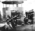 USS Monitor (1862) 
 
    Crewmen relaxing on deck, while the ship was in the James River,
    Virginia, on 9 July 1862. View looks forward on the starboard
    side, with the gun turret beyond. 
    Note men playing checkers at right. Ano