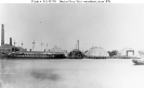 Boston Navy Yard, Charlestown, Massachusetts 
 
    View of the waterfront, seen from East Boston circa 1876. 
    Ships at left are USS Wabash, outboard, with USS Niagara
    housed over inboard of her. USS Iowa (ex-Ammono