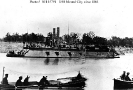 USS Mound City (1862-1865) 
 
    Photographed on the Western Rivers, 1864. 
    Note rowing boats in the foreground. That at left has a fancy-edged
    awning. 
 
    U.S. Naval Historical Center Photograph.