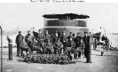 Passaic Class Monitor 
 
    Ship's officers on the deck of a Passaic class monitor,
    circa 1864-65. 
    This ship has been identified in one published source as USS
    Sangamon and in another as USS Patapsco. Oth