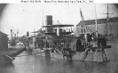 Washington Navy Yard, D.C. 
 
    Ships moored in the Anacostia River off the Yard's waterfront,
    after the end of the Civil War, about 1865. 
    The large twin-turret monitor in the center is Miantonomoh,
    with the smaller monitor