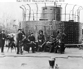 USS Lehigh (1863-1904) 
 
    The monitor's officers pose on deck, probably while she was serving
    on the James River, Virginia, in 1864-65. 
    Probably photographed by the Matthew Brady organization. 
    Note dent in the conning tow