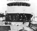 USS Saugus (1864-1891) 
 
    Officers pose on deck, in front of the gun turret, probably while
    the ship was serving on the James River, Virginia, in early 1865. 
    Note ship's bell and other details of the turret and deck fittings. 
