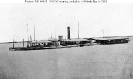 USS Milwaukee (1864-1865) 
 
    Probably photographed in Mobile Bay, Alabama, in early 1865. 
    Note awnings spread over her decks and anti-mine 