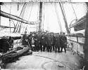 USS Kearsarge (1862-1894) 
 
    Ship's officers pose on deck, at Cherbourg, France, soon after
    her 19 June 1864 victory over CSS Alabama. 
    Her Commanding Officer, Captain John A. Winslow, is 3rd from
    left, wearing a uni