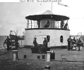 USS Catskill (1863-1901) 
 
    Officers posing on deck and atop the turret, while the ship was
    in Charleston harbor, South Carolina, in 1865. The Commanding
    Officer, Lieutenant Commander Edward Barrett, is seated on the
    turret