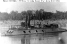 USS Mound City (1862-1865) 
 
    Photographed on the Western Rivers, circa 1864-65. 
    Note pilothouse constructed atop her armored conning tower, deckhouse
    constructed forward of her paddle box, and light-colored five-pointed
    s