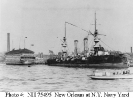 USS New Orleans (1898-1929) 
 
    Docked at the New York Navy Yard, April 1898, immediately after
    her maiden voyage from England. The receiving ship USS Vermont
    is at left. Note New Orleans' extra-long commissioning

