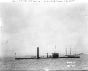 USS Canonicus (1864-1908) 
 
    In Hampton Roads, Virginia, 12 June 1907. 
    Note the three-masted schooner at right, with two U.S. Navy armored
    cruisers beyond her, and the Navy collier in the left center
    distance. 
 
    