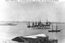 Peabody Funeral Fleet, January 1870 
 
    Probably photographed at Portland, Maine. 
    The most distant ship, in right center, is HMS Monarch,
    which carried the body of the late philanthropist George M. Peabody
    home to the Unite