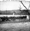USS Kansas (1863-1883 
 
    Photographed on the James River, Virginia, circa February-April
    1865. 
    Note her white smokestack, and three officers seated on shore. 
 
    Collections of the Library of Congress.